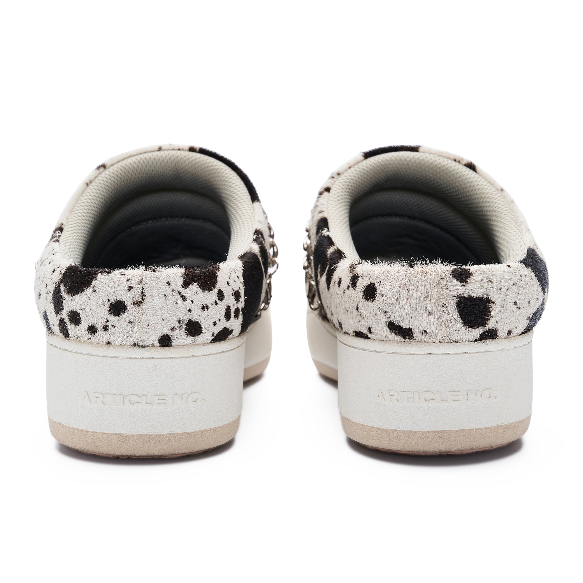 ARTICLE NO. 051X-9002F-23 BLACK AND WHITE COWHIDE BURGER MULE